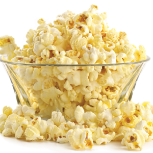 large clear bowl overflowing with popcorn pictured on white background