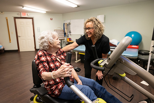 therapist working with senior woman